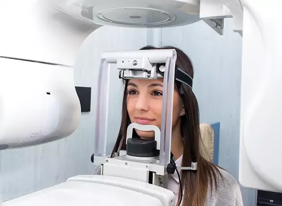 Woman receiving dental x-ray