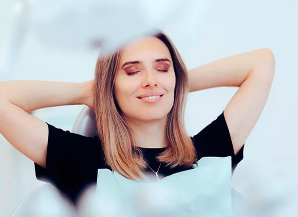 Relaxed woman in dental chair