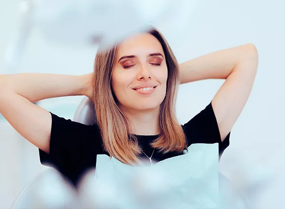 Relaxed woman in dental chair